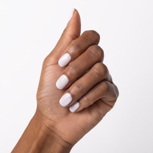 Hand with Breathe Free painted on nails