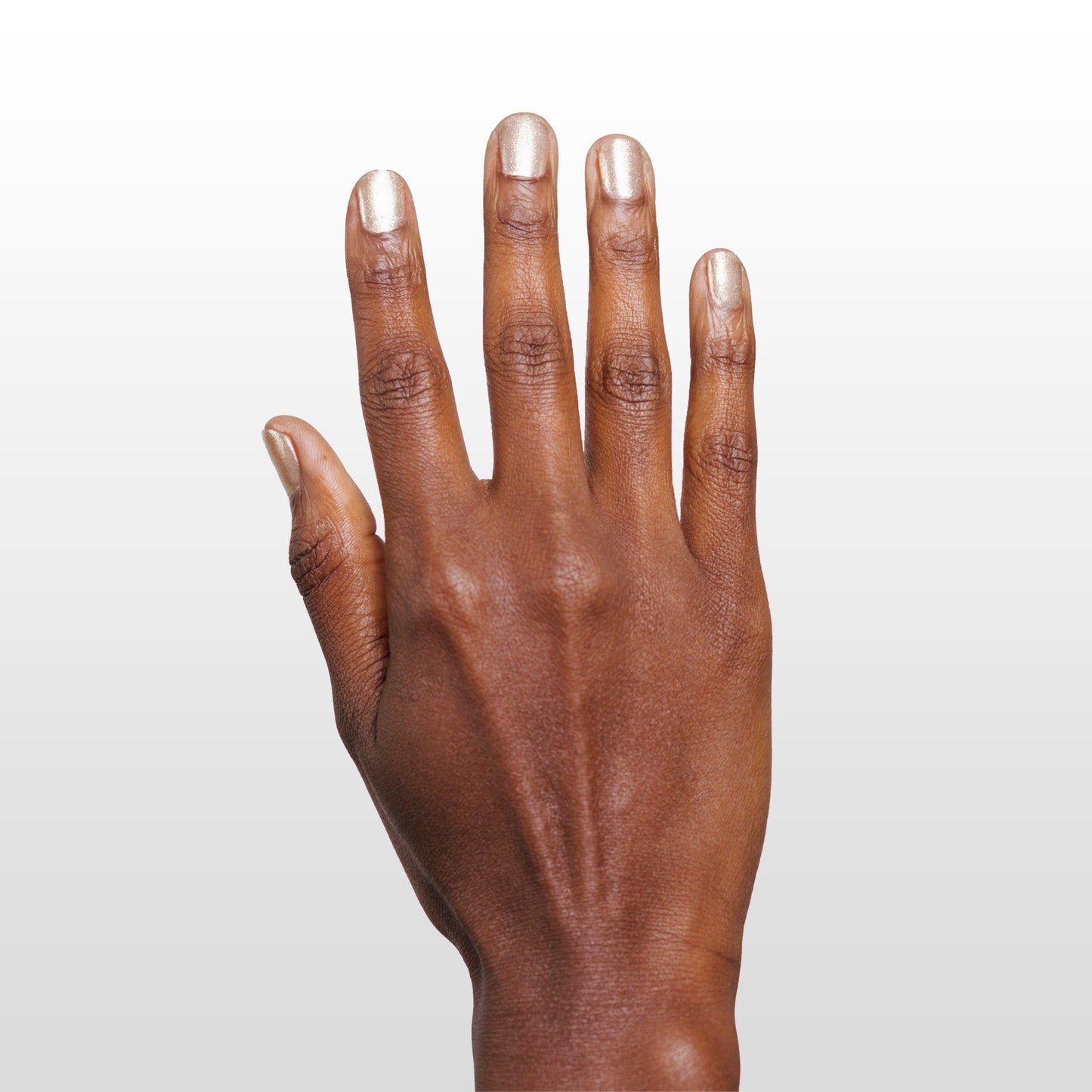 Hand with Stargazer painted on nails