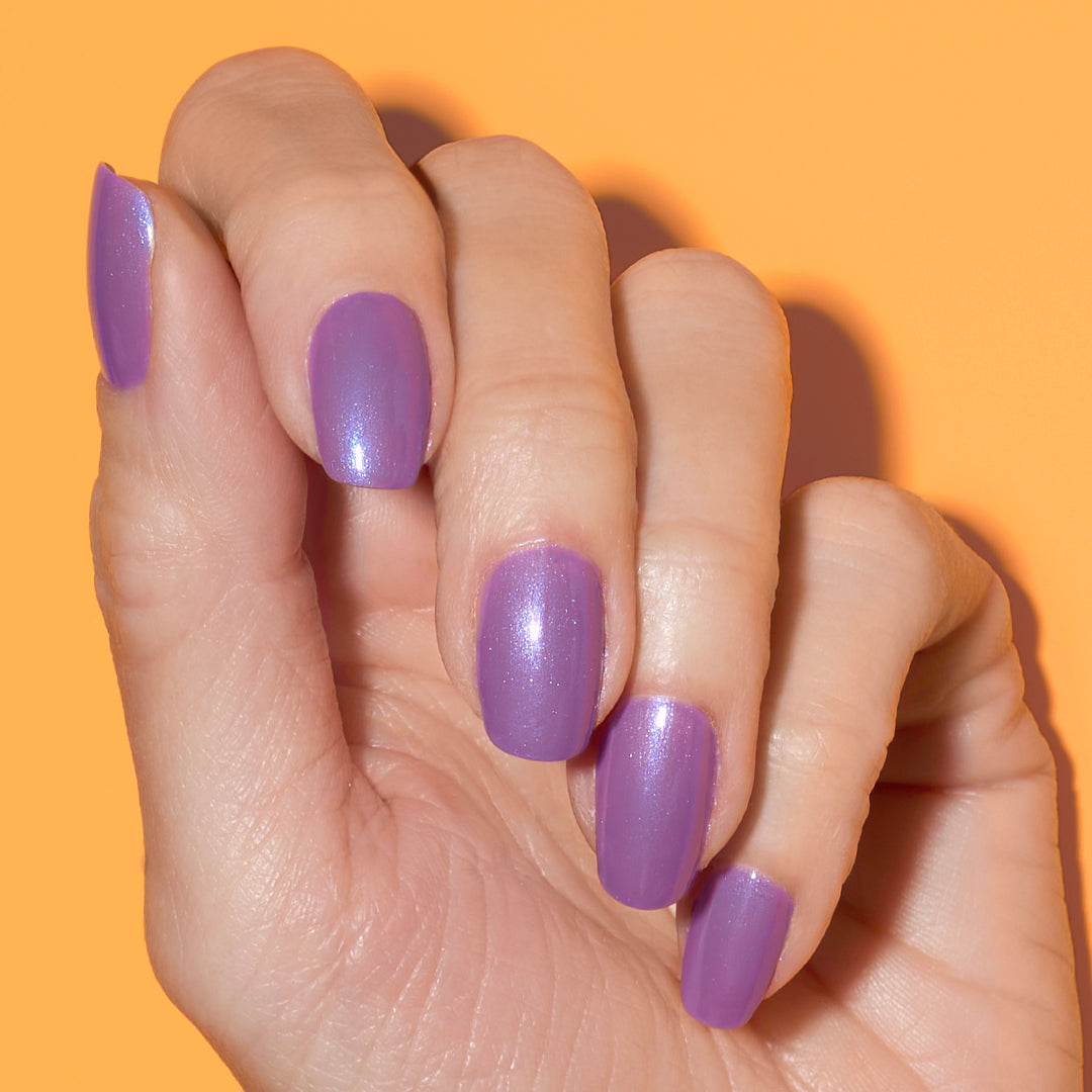 Hand with Tropical Twilight painted on nails