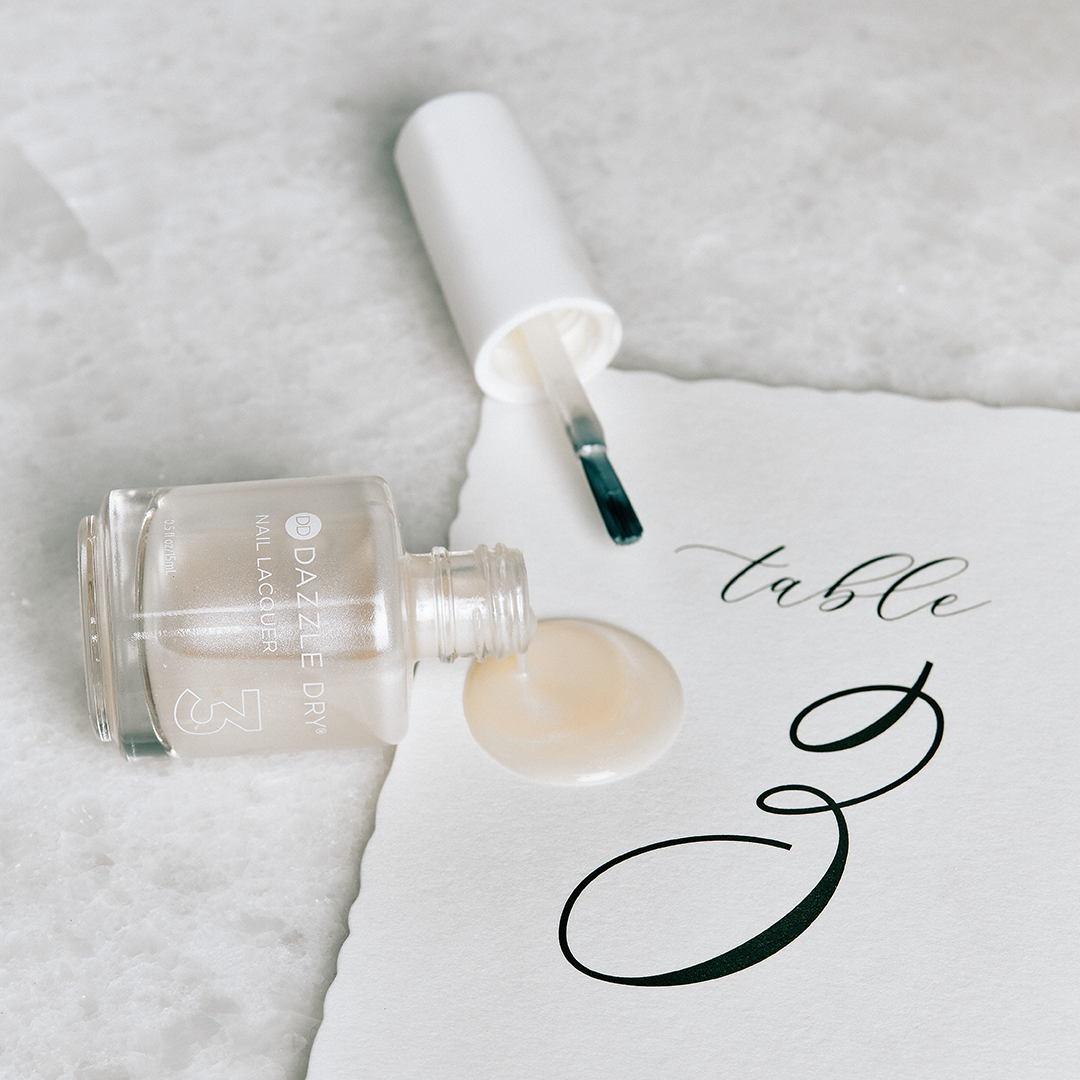 Pearl Lacquer Bottle open and spilt on piece of paper