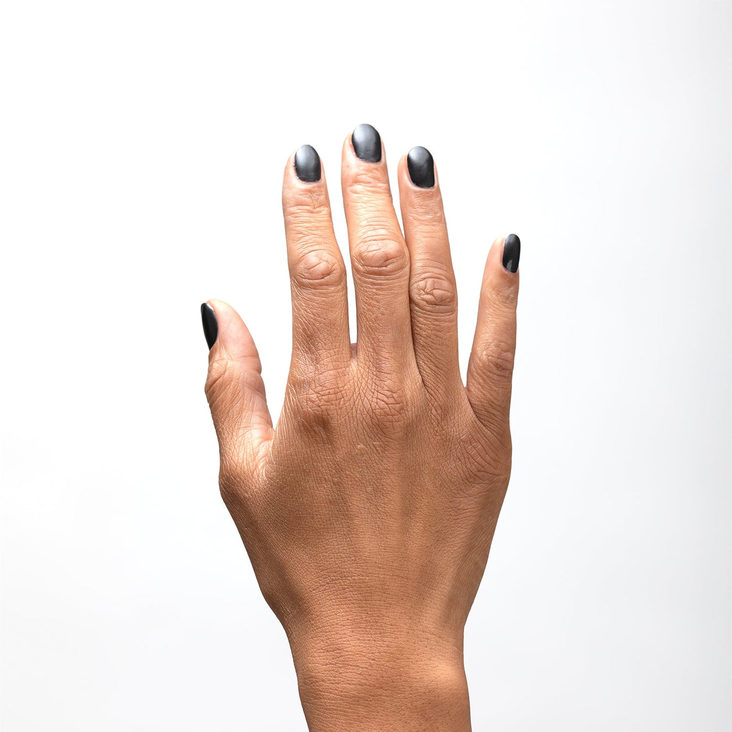 Hand with Bold painted on nails