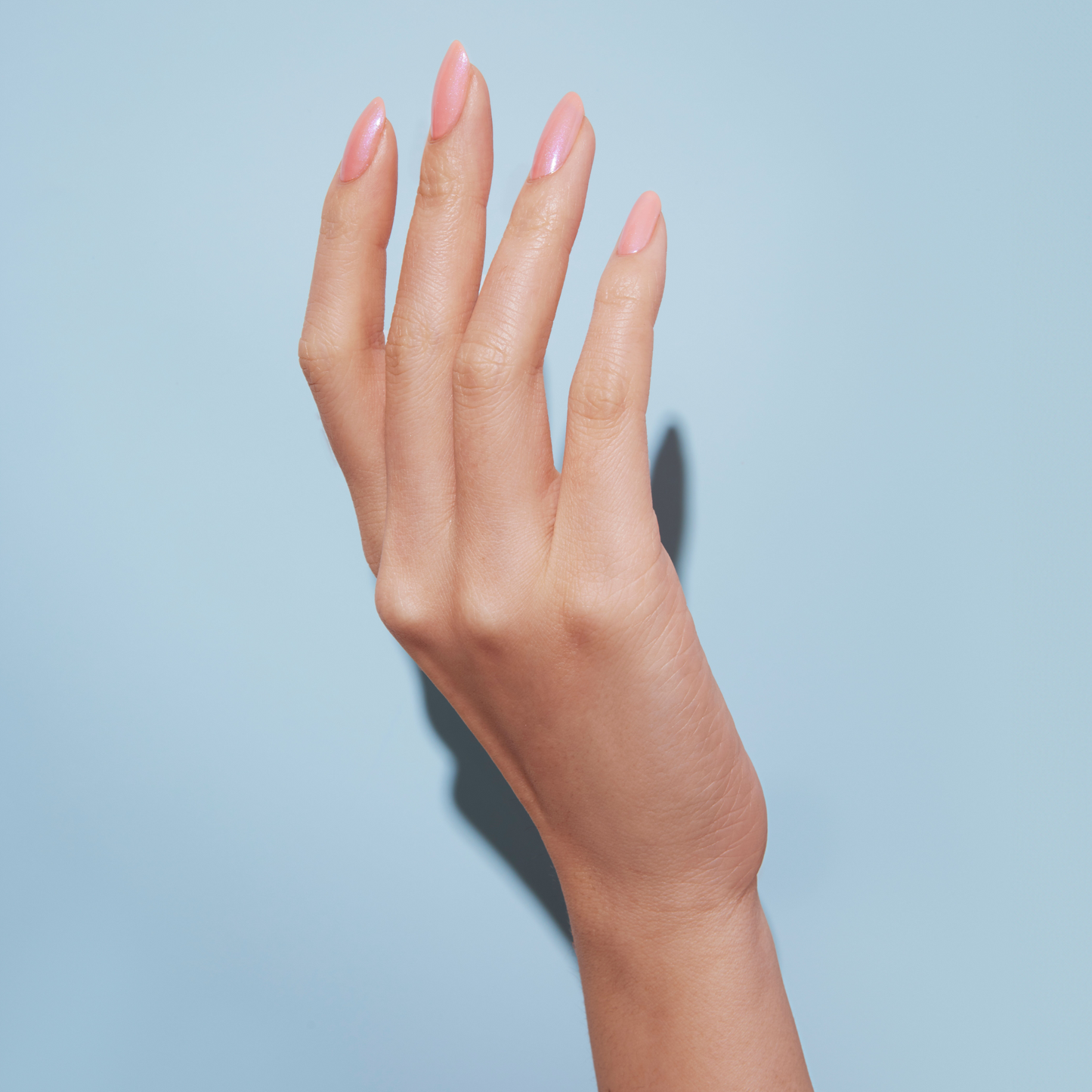 Hand with Milky Way painted on nails