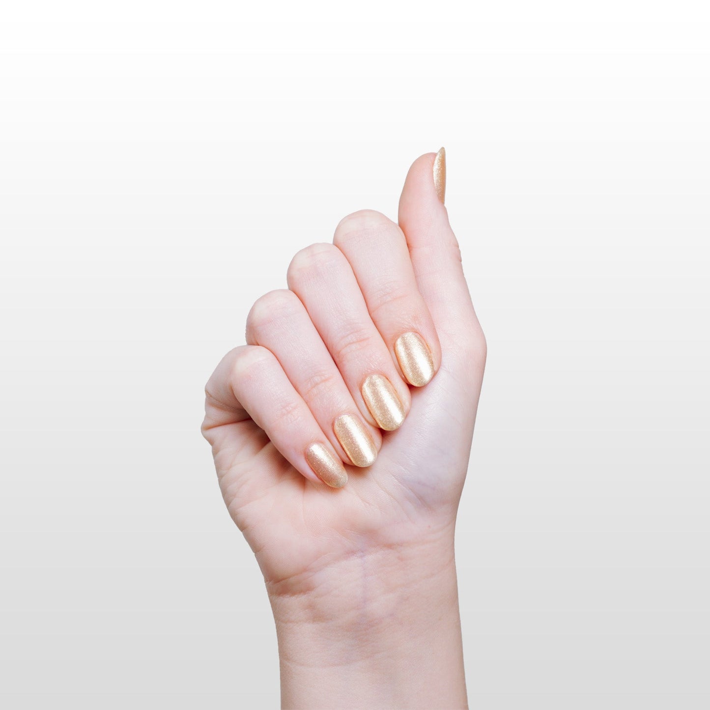 Hand with Stargazer painted on nails